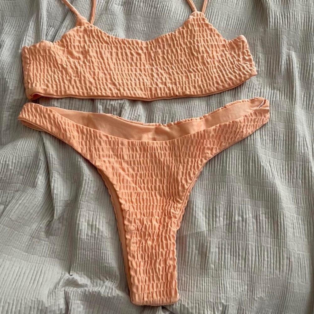 Peach bandeau high waist bikini. Top not padded. Never worn.
